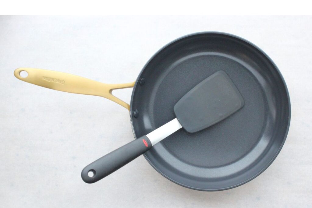 Overhead view of non-stick pan and silicone spatula