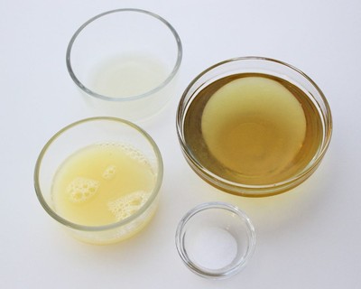 Mayonnaise-ingredients-400 Mayonnaise ingredients in glass bowls including avocado oil, egg whites, lemon juice, and salt