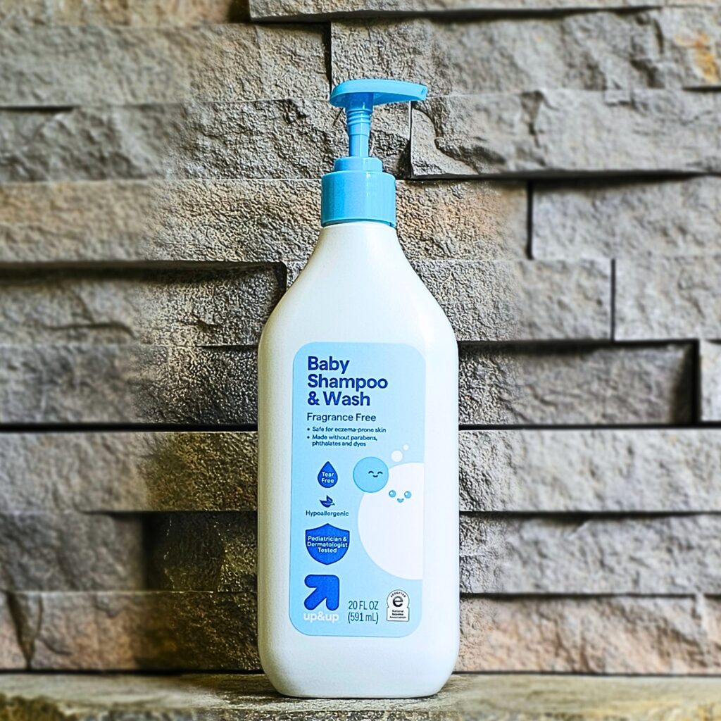 up&up Baby Shampoo & Wash on a stone shelf