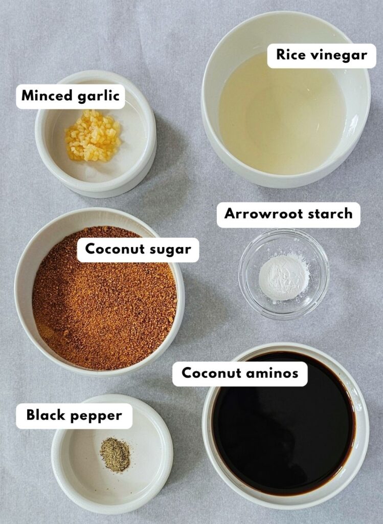 Overhead view of recipe ingredients, each measured out in a small white or glass bowl.